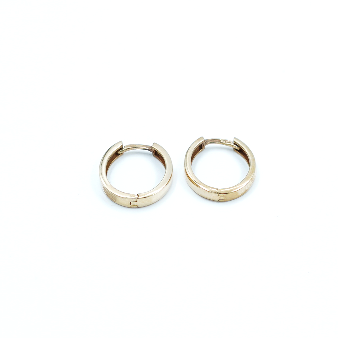 Ladies Yellow Gold Narrow Oval Huggie Earrings